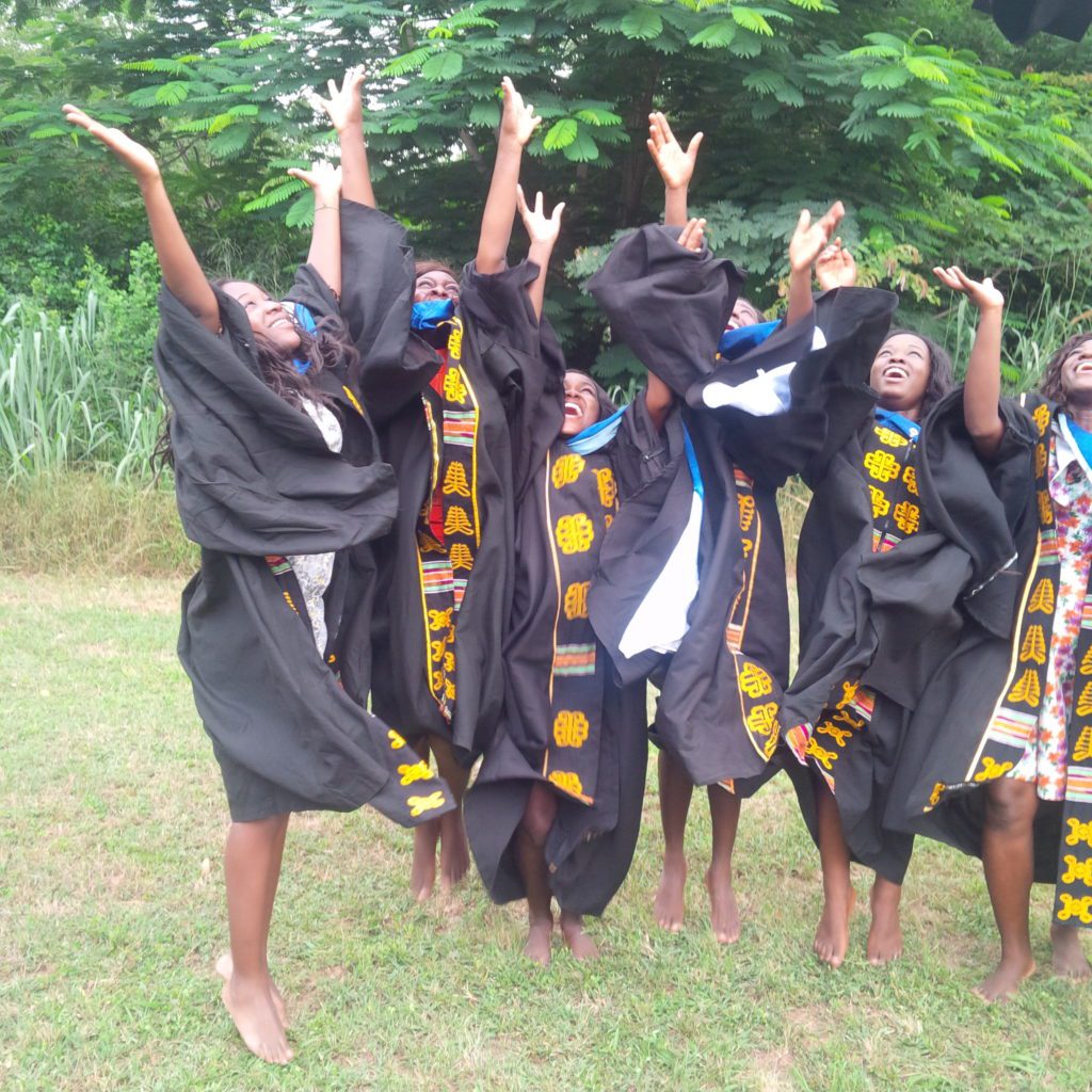 Jullie Jay-Kanz and her colleagues celebrating their graduation