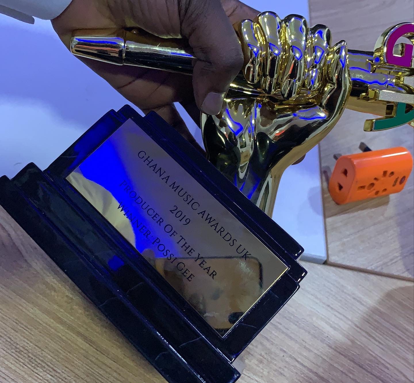 Producer Possigee receives Ghana Music Awards UK Plaque.